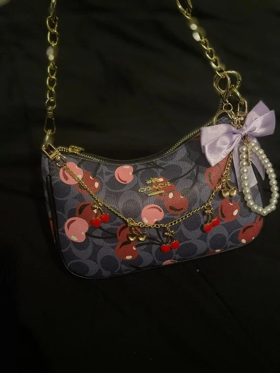 🍒 Bolsa Coach coquette con moños