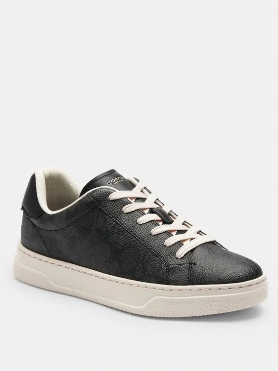 Coach woman’s Black Leather Low-Top Sneaker with Cream Accents