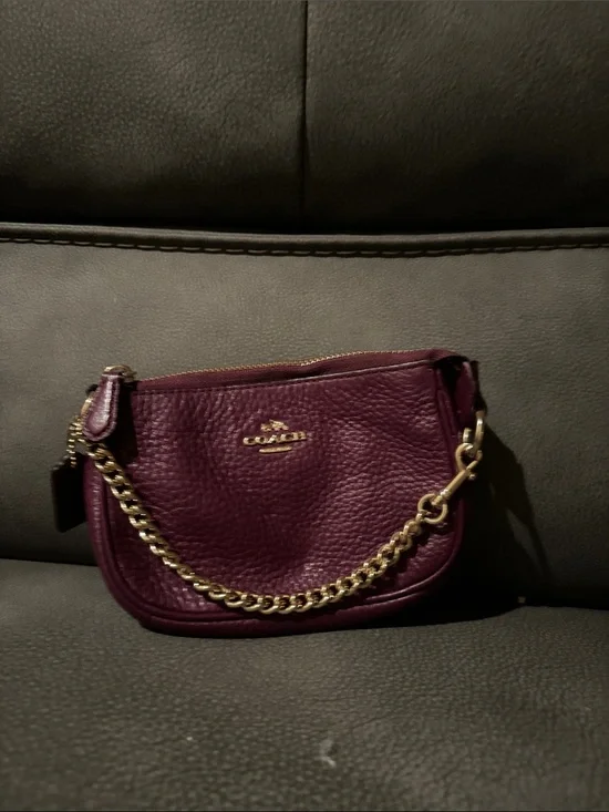 Coach Pebbled wristlet in Plum with Gold Chain