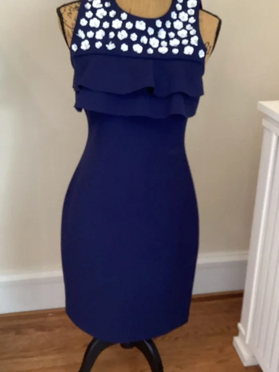 Michael Kors Navy Sheath Dress with White large sequin yoke and ruffle detail.