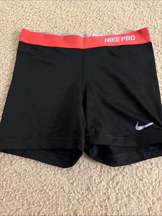 Nike Black Shorts with Coral Waistband and White Swoosh