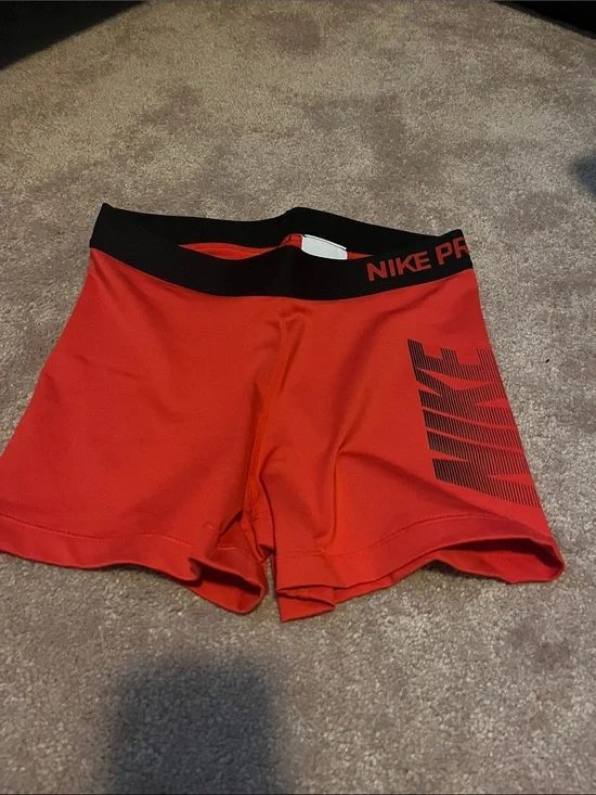 Nike Pro Women's Red Training Shorts with Black Waistband