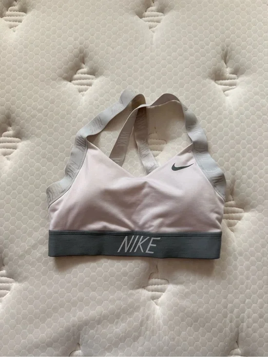38. Nike Pink and Gray Cross-Back Sports Bra