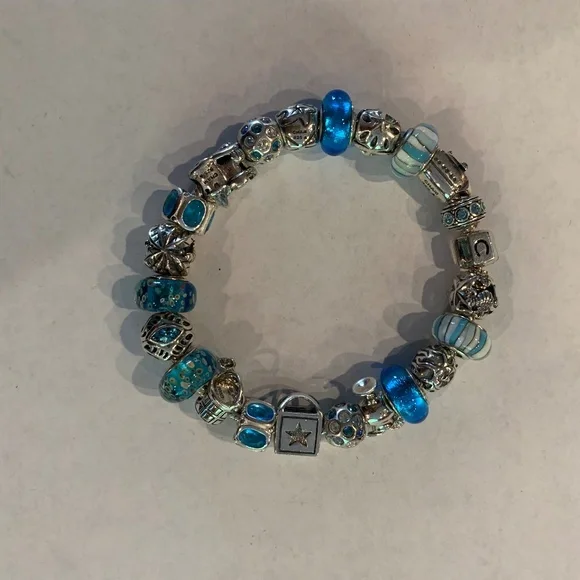 Chamilia 8 inch Silver charm bracelet with 22 charms