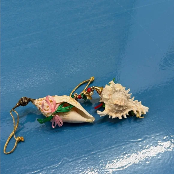 Elegant Shell Ornament with Pink and Green Accents