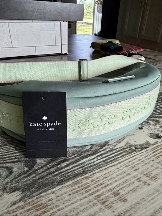 kate spade mint green logo plaque handbag front