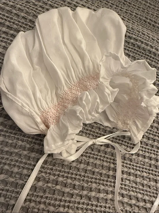 White Smocked Baby Bonnet with Pink Detail