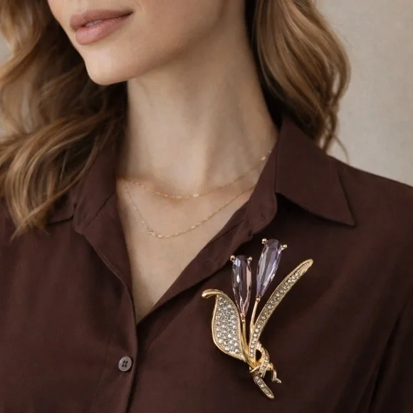 Gold-Tone Floral Crystal Brooch with Amethyst Stones