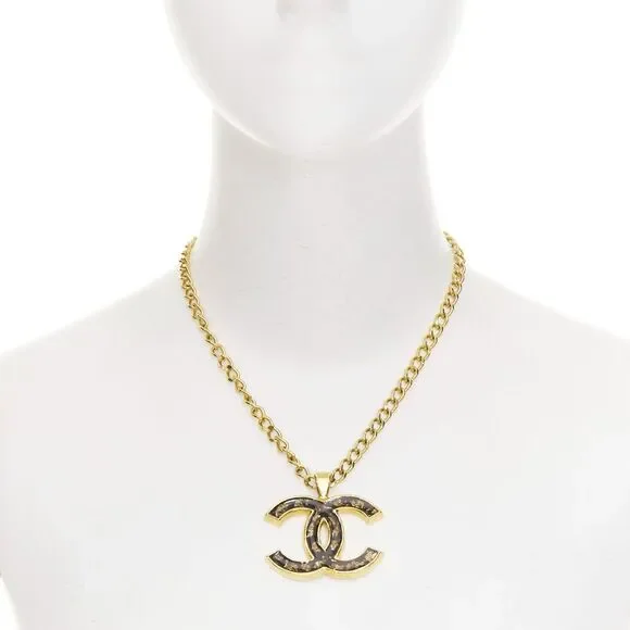 Chanel gold resin CC logo pendant short chain necklace