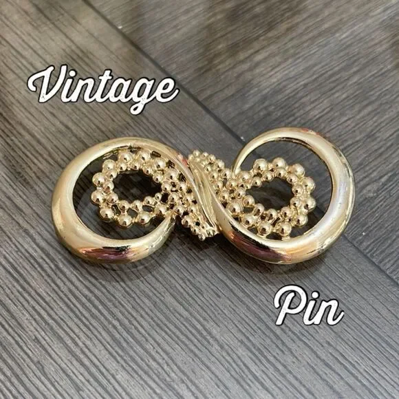 Vintage VAL Elegant Infinity Gold-tone Brooch