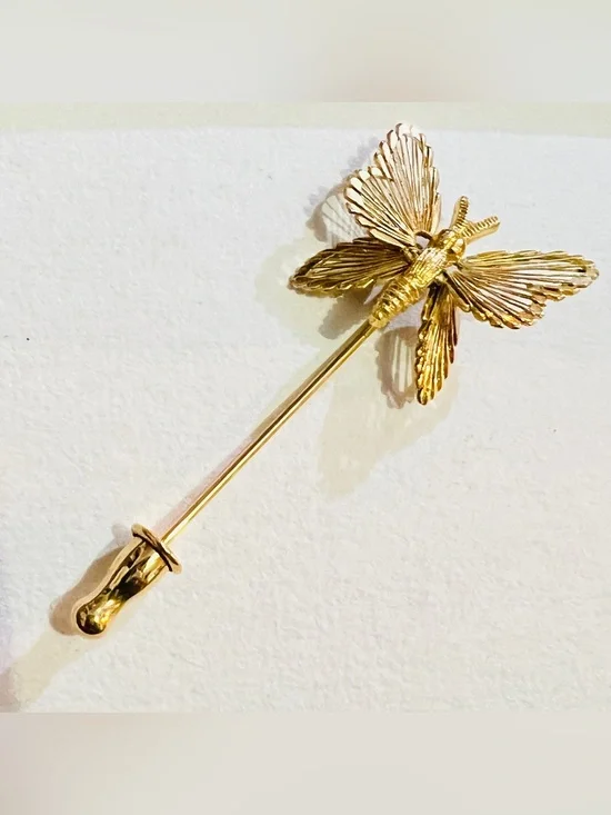 Vtg Monet gold-tone butterfly stick pin featuring delicate filigree wings