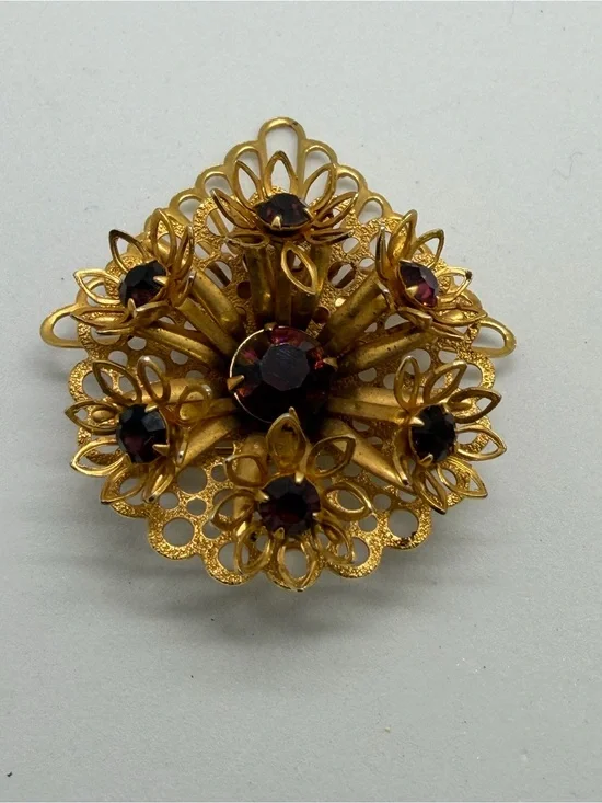 Vintage Gold-Tone Floral Brooch with Deep Red Stones