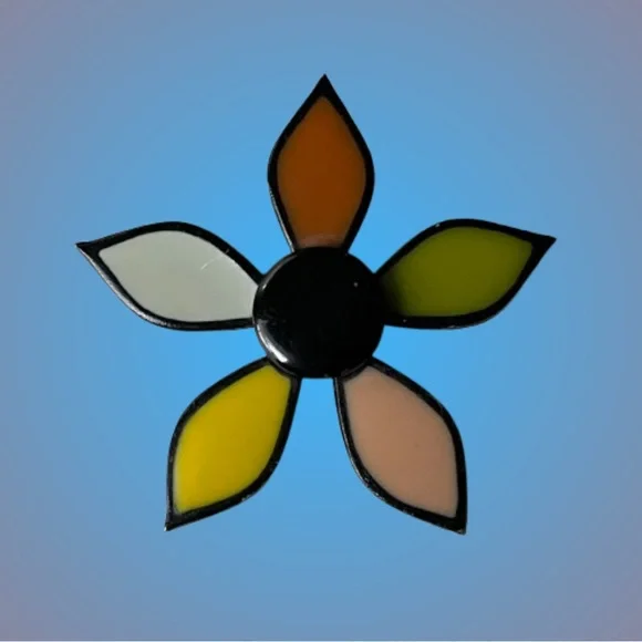 Vintage black metal five petal flower brooch w/ colorful enamel hippie boho mod