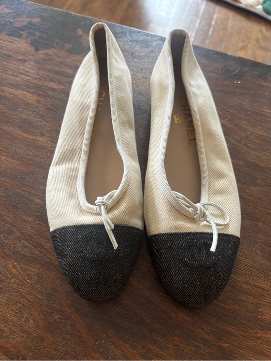 CHANEL Ivory Canvas Ballet Flats with Black Cap Toe and Bow