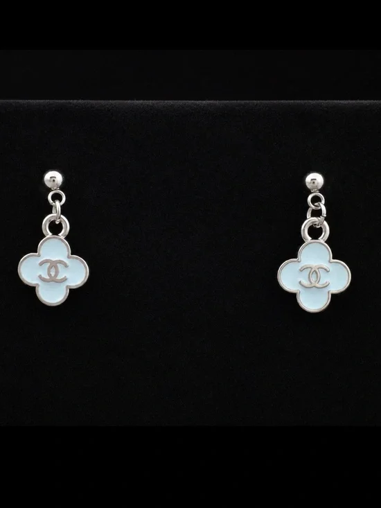 CHANEL Silver-Tone Dangle Earrings with Pale Blue Enamel Clover Motifs