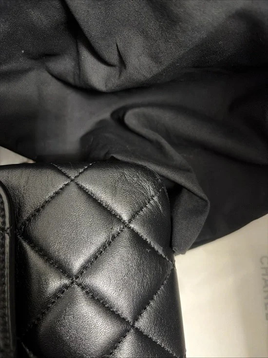 CHANEL Black Quilted Leather Small Flap Bag