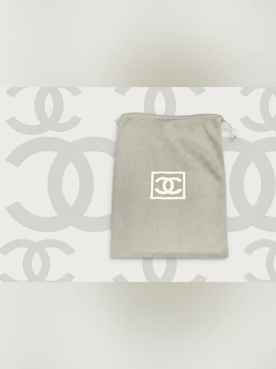 Rare authentic Chanel luxury designer signature mesh storage dust bag