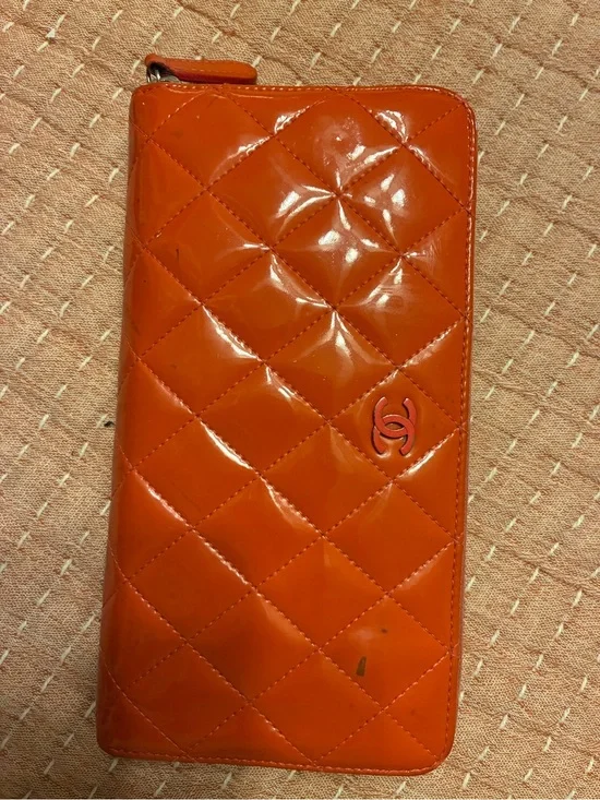CHANEL Quilted Patent Leather Zip Wallet in Bright Orange