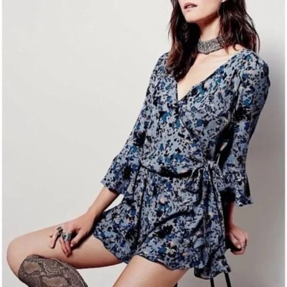 FREE PEOPLE “all the right ruffles” romper