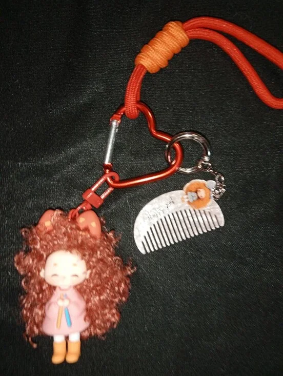 Orange Doll Keychain with Comb Charm