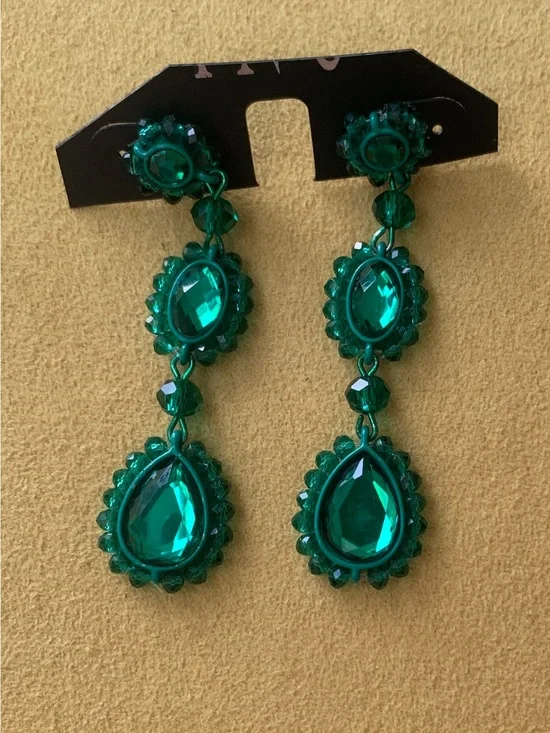 Never used .. Vintage emerald green long earring.