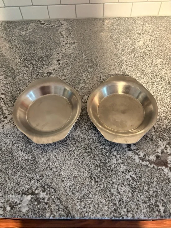 Set of two copper coated oval bowls