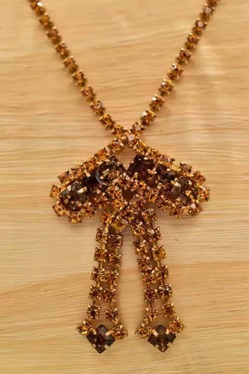 Vintage Crystal Bow Necklace Chocolate Orange Gold Prong Rhinestone 1960s BinBJ