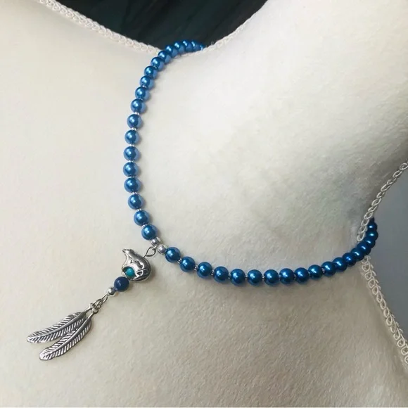 Handcrafted repurpose southwest bear feather pendant Czech glass Pearl necklace