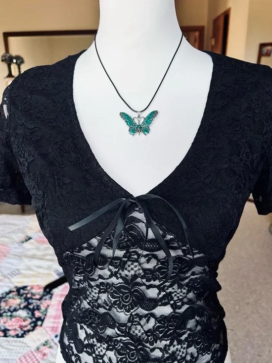 Gothic pendant butterfly necklace in green on black cord chain