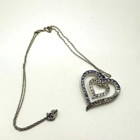 Genuine 1.5ctw tanzanite and‎ CZ accent heart necklace in sterling silver!