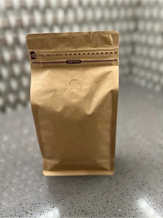 New package of medium roasted Starbucks coffee beans 9”x5”x3”