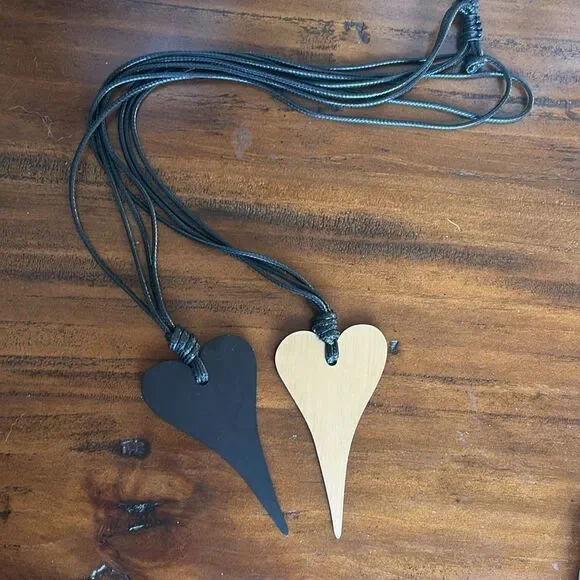 Fashion jewelry Faux leather necklace with heat pendant NWOT
