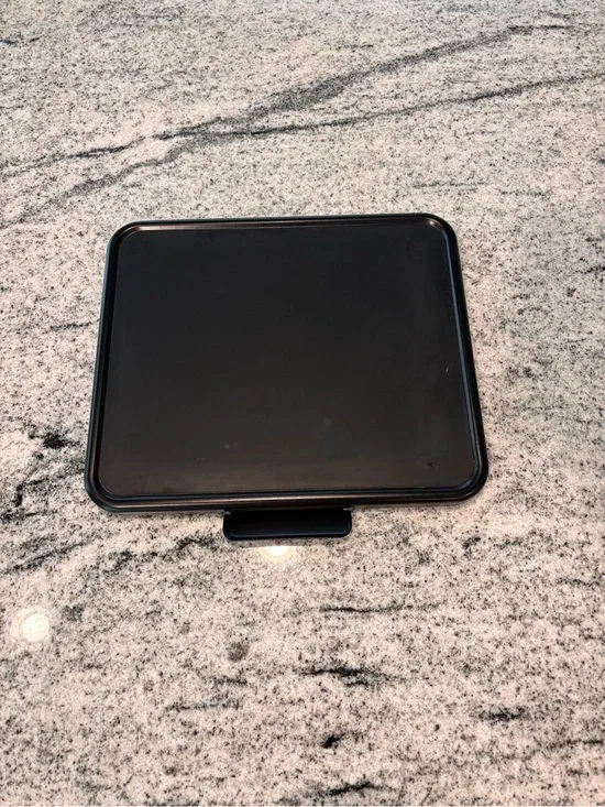Black sliding tray to fit under your heavy coffee maker to easily slide out fro.