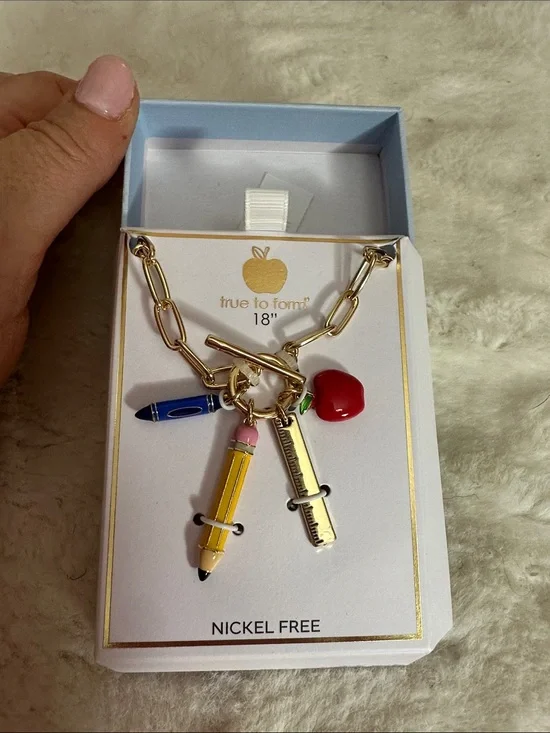 True to form 18” teacher- themed charms  gold necklace