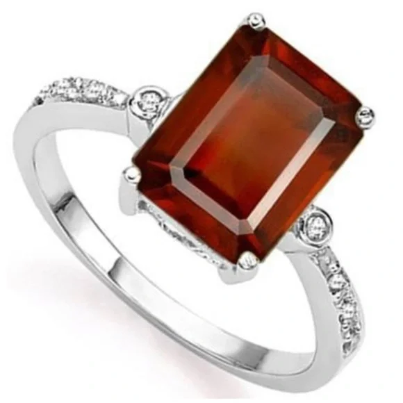 4CT Garnet and Diamond Ring‎ in Sterling Silver