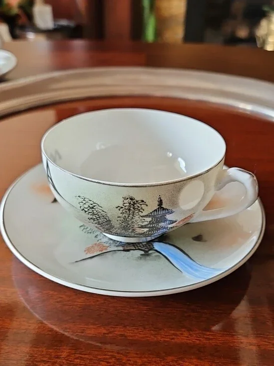 Vintage Porcelain Teacup & Saucer Set in White with Blue and Tan Accents