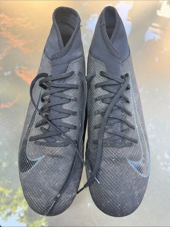 Nike Men’s Black Soccer Cleats with Subtle Blue Swoosh