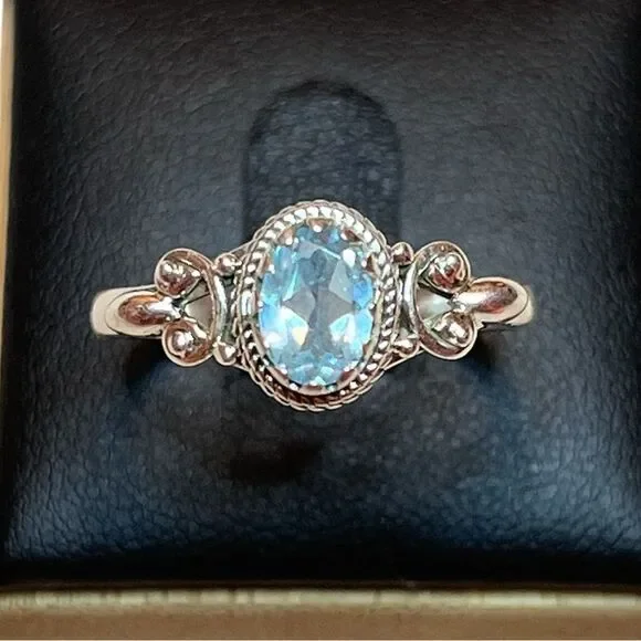 Elegant Sterling Silver and Blue Topaz Gemstone Ring Size 10