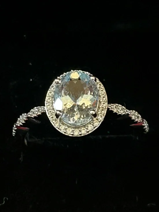 1.40CT Oval Aquamarine w/.16CTW Round White Zircon in Rhodium over 925 Silver S9