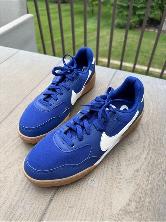 Nike Blue Sneakers with White Swoosh and Gum Sole