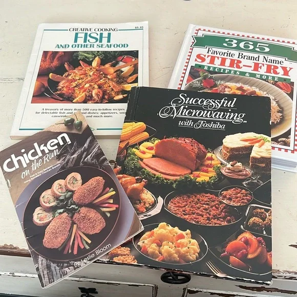 Grouping of vintage cookbooks. Stir fry, Fish, Chicken and Microwave