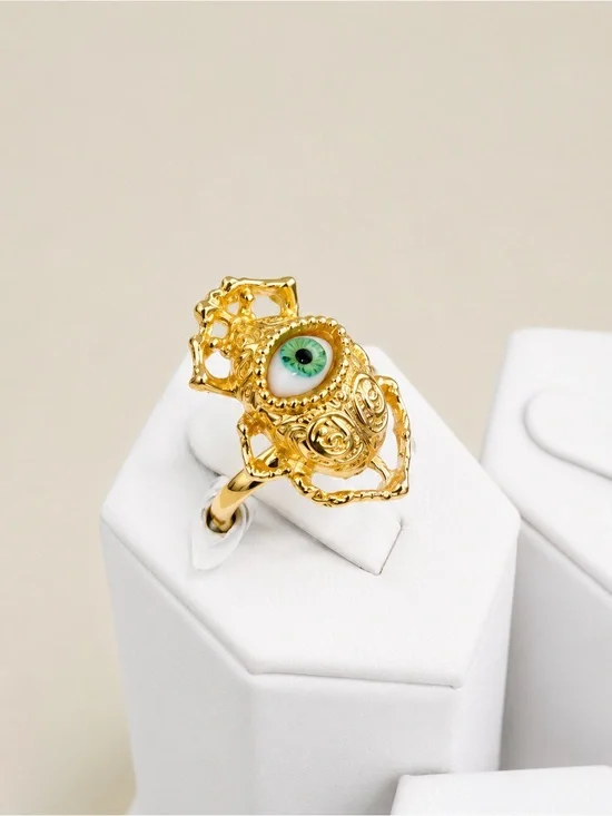 Gold Filigree Ring with Green Eye Accent