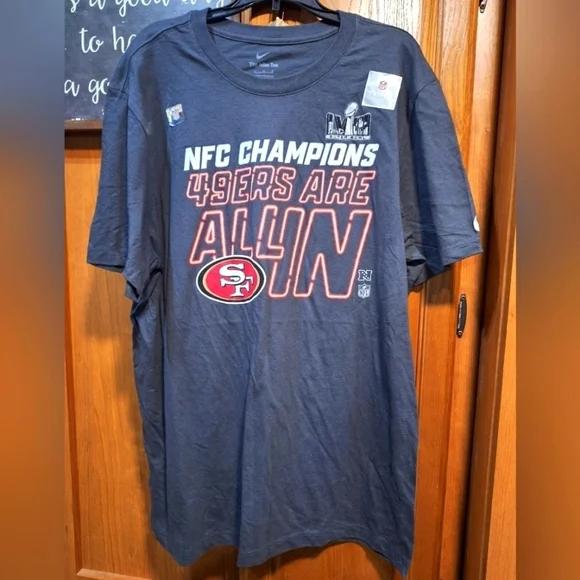 A Nike official NFL San Francisco 49ers  NFC Champions short sleeve t-shirt. NWT