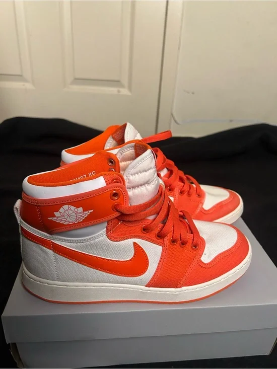 Nike Air Jordan 1 Mid White & Orange Sneakers