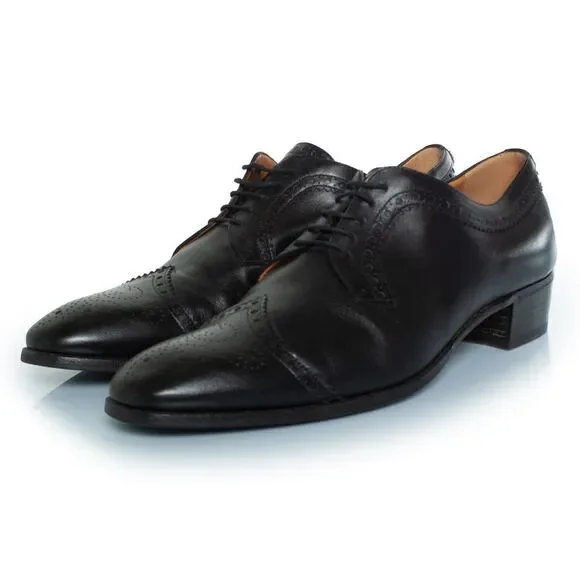 Gucci Lace up brocade with gold studded heel