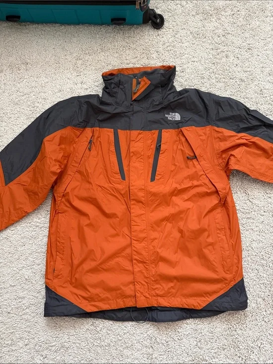 The North Face Orange and Black Waterproof Rain Jacket