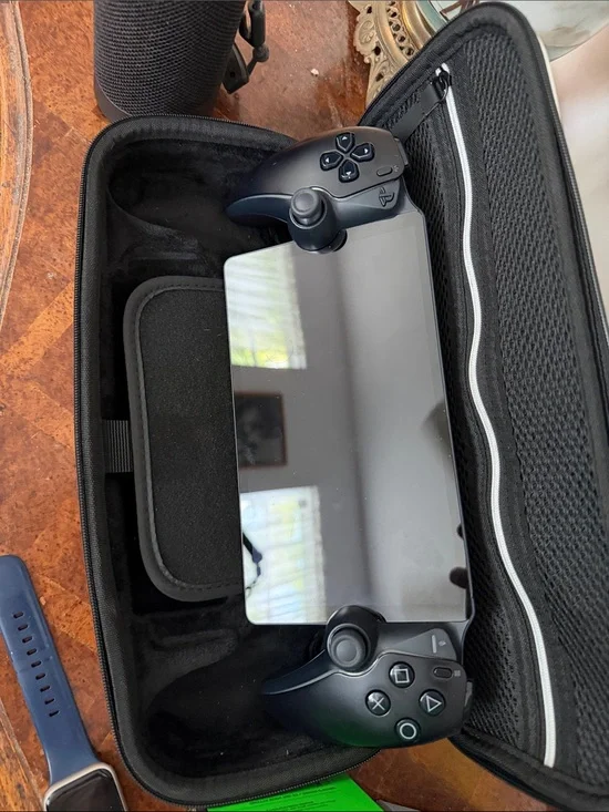 Sony Black Portable Gaming Console with Dual Controllers