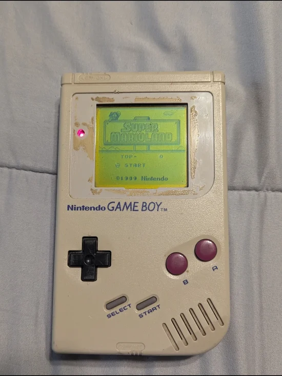 Nintendo Game Boy Portable in Cream with Purple Buttons