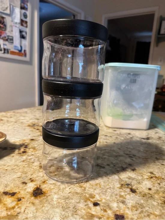 Three-Piece Clearly elegant Stackable Storage Jars with Black Lids Tupperware