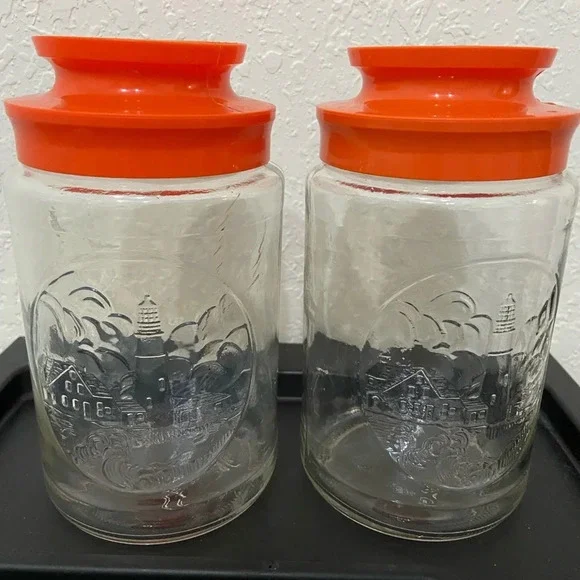 Set of 2 Anchor Hocking Glass Tang Jar Orange Lid Lighthouse Storage Canister